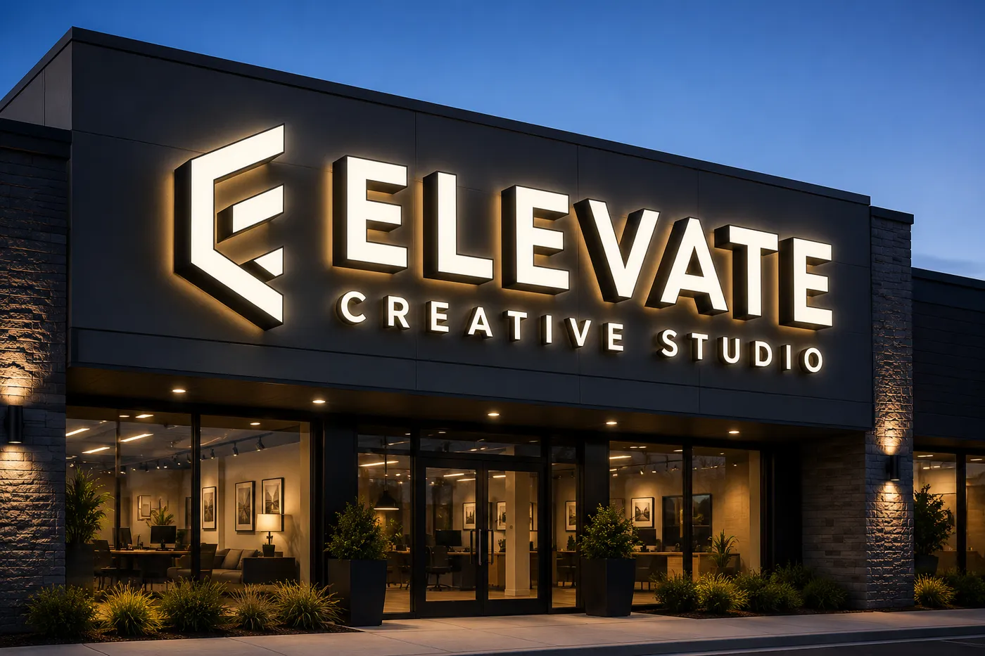 Illuminated channel letters reading Elevate Creative Studio on a storefront at night — Custom Channel Letter Sign demo product